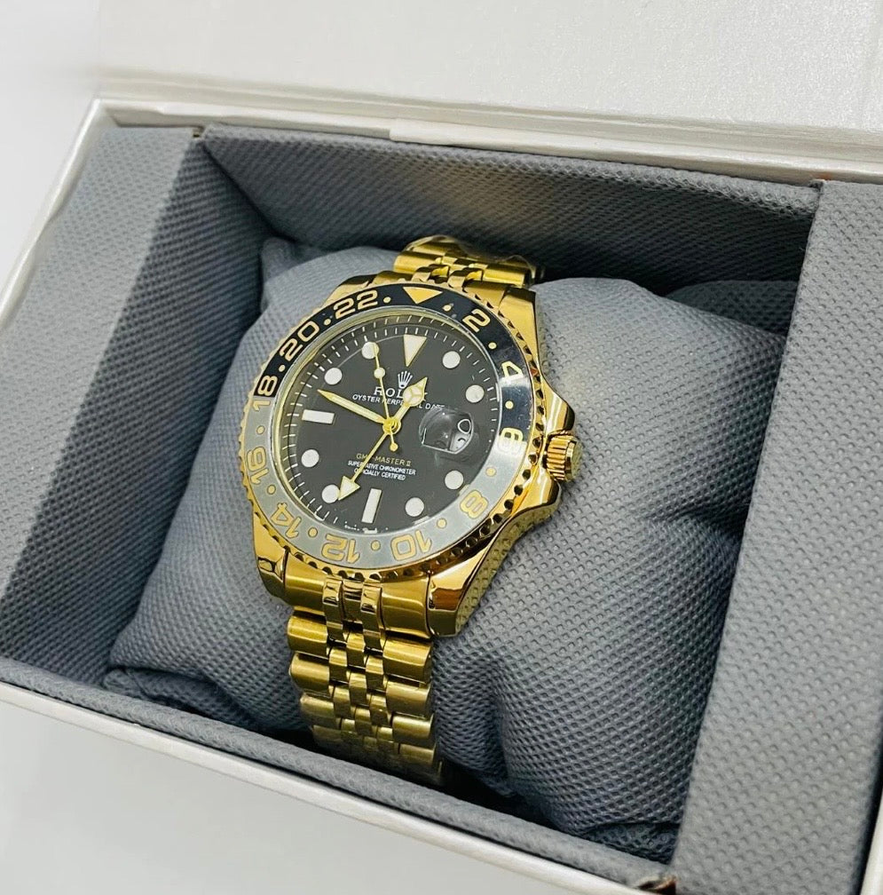 Rolex GMT Master - 40mm - Stainless Steel - Yellow Gold Black Dial Jubilee