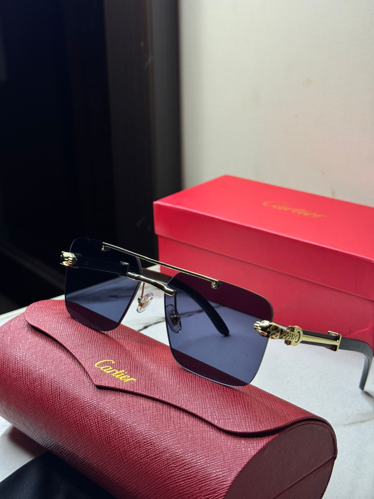 Cartier Rimless Lion Shades'